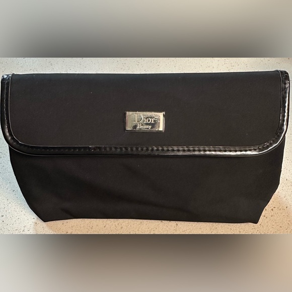 Dior cosmetic Bag with Magnetic closure. Inside is clean. - Picture 2 of 4